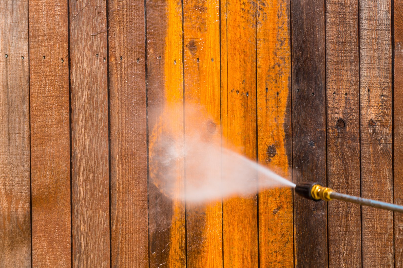 Pressure washing the fence